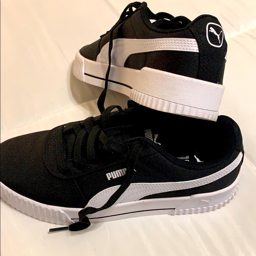 Women’s Black Pumas Size 8.5